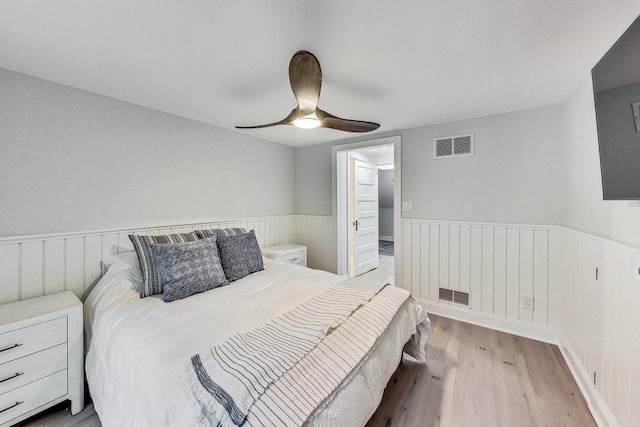 bedroom featuring ceiling fan and light hardwood / wood-style floors