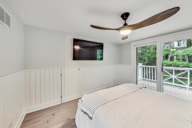 bedroom with ceiling fan, access to outside, and light hardwood / wood-style floors