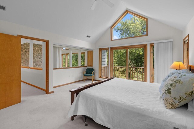 bedroom with ceiling fan, high vaulted ceiling, carpet floors, and multiple windows