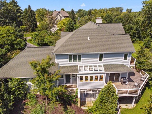 rear view of house with a lawn