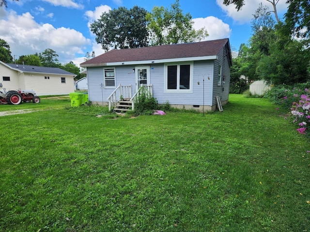 view of front of home with a front yard