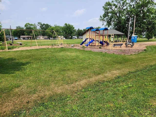 view of play area featuring a lawn