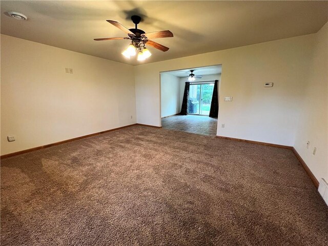 15716 Logan Ln, Hayward, WI 54843 - unfurnished room with ceiling fan, baseboards, and carpet