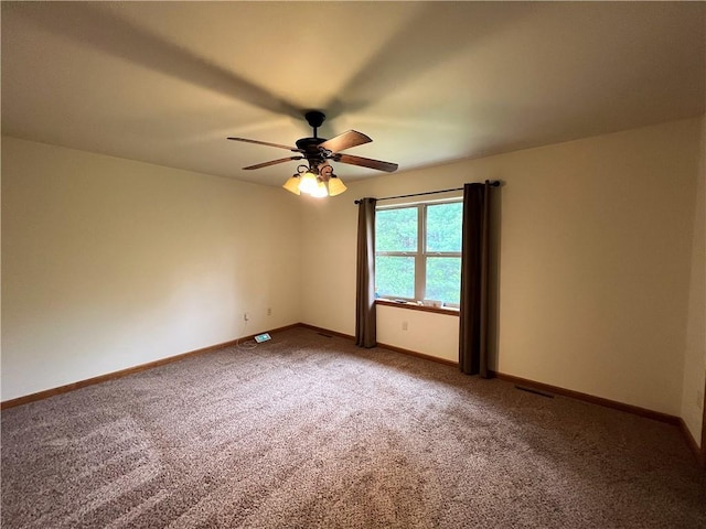 carpeted empty room with ceiling fan