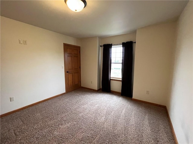 view of carpeted spare room