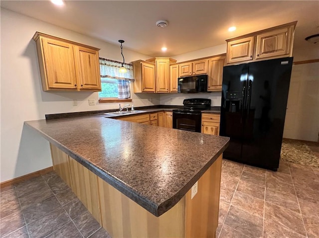 kitchen featuring kitchen peninsula, tile patterned floors, hanging light fixtures, and black appliances