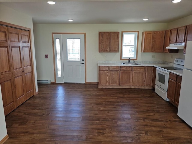 kitchen featuring plenty of natural light, white electric stove, sink, and a baseboard heating unit
