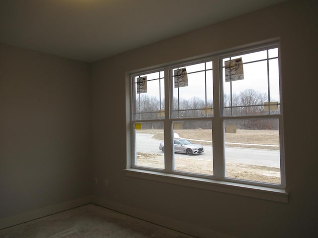 unfurnished room with a healthy amount of sunlight