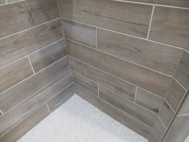 518 Woodside Ct, West Bend, WI 53095 - interior details with tiled shower