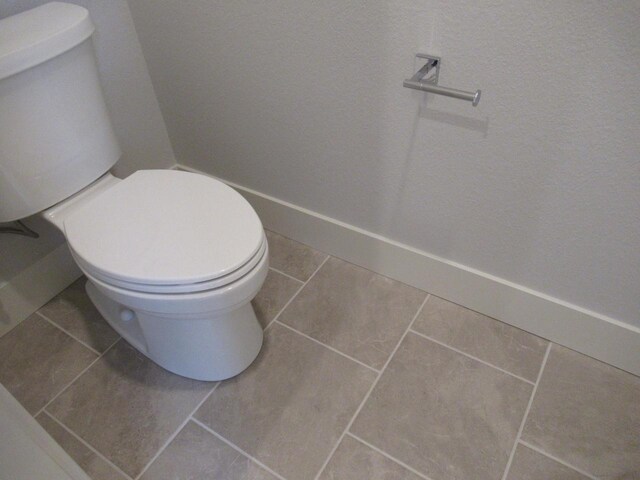 518 Woodside Ct, West Bend, WI 53095 - bathroom featuring toilet and tile patterned flooring