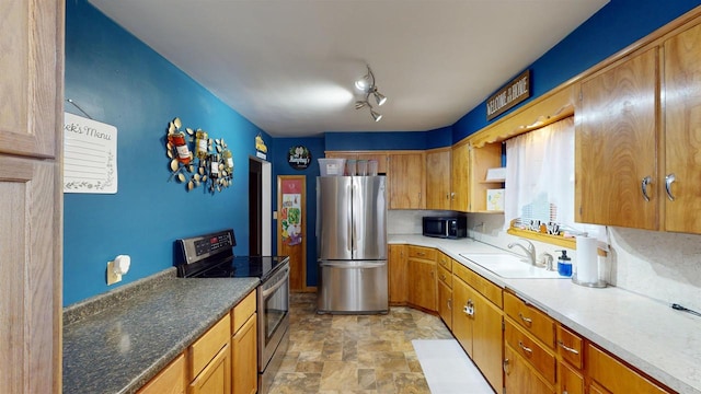 kitchen featuring sink and appliances with stainless steel finishes