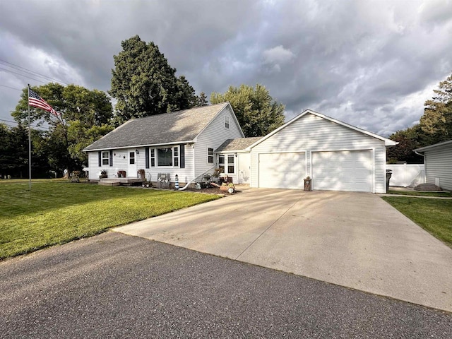 view of front facade featuring a garage and a front yard