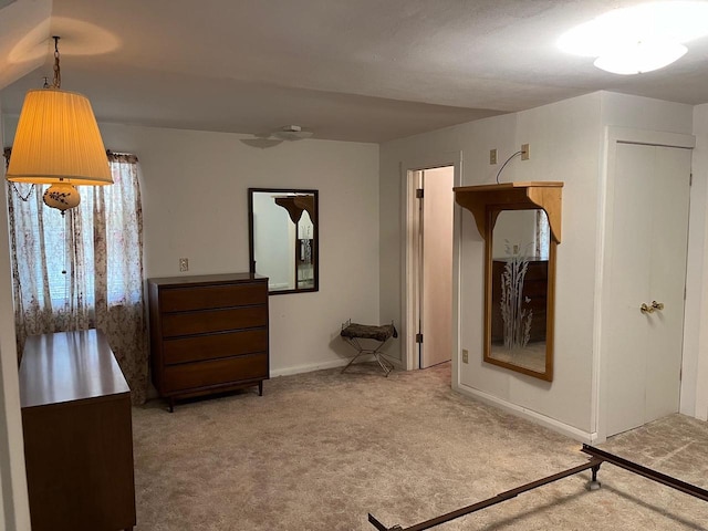 unfurnished bedroom with carpet flooring and a closet