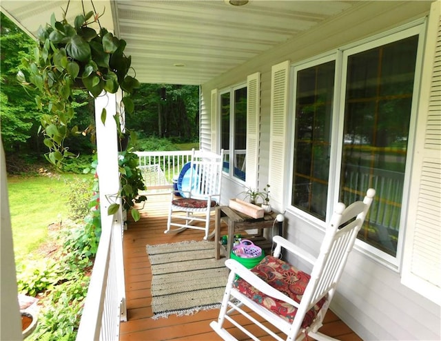 deck featuring covered porch