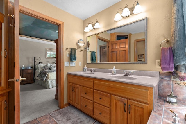 bathroom with vanity and tile patterned floors