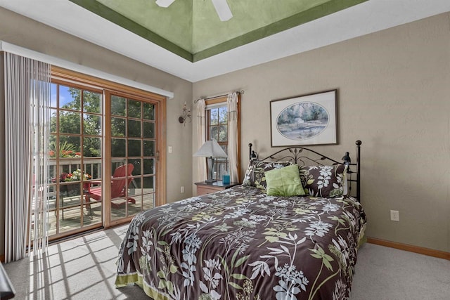 bedroom with access to outside, ceiling fan, and carpet