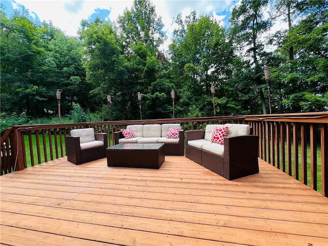 wooden deck featuring an outdoor hangout area