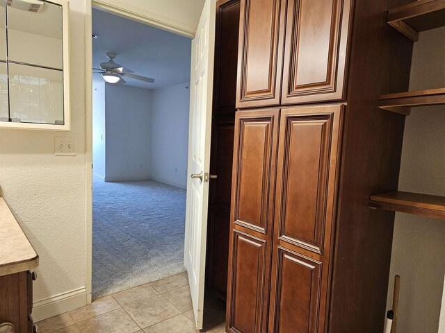 bedroom with dark hardwood / wood-style floors and two closets