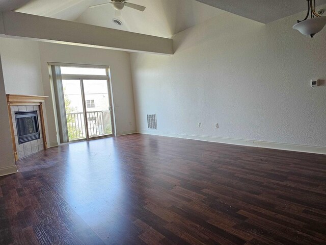 living room featuring wood-type flooring and a fireplace