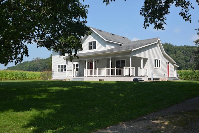 view of front facade with a porch and a front lawn