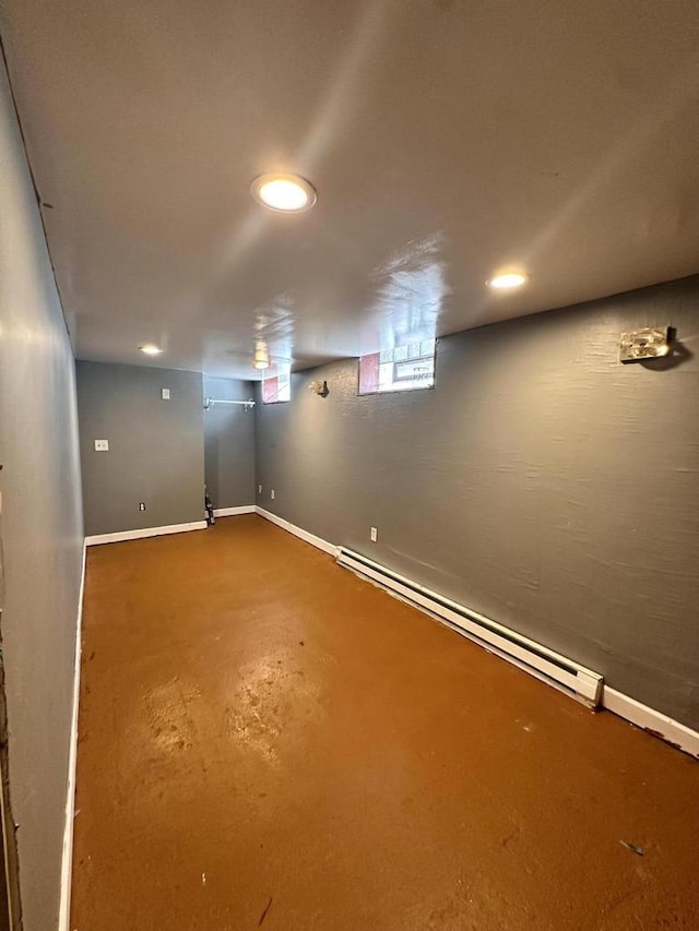 basement featuring a baseboard radiator