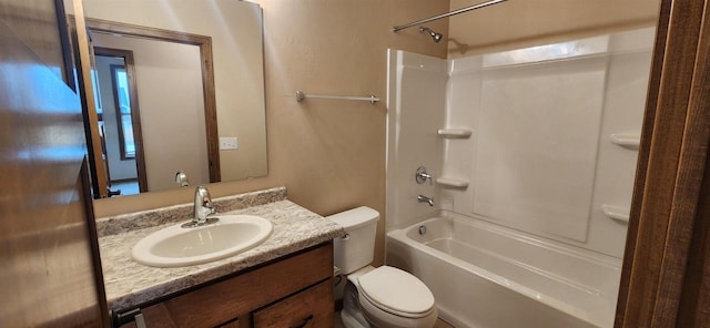 full bathroom with bathing tub / shower combination, vanity, and toilet