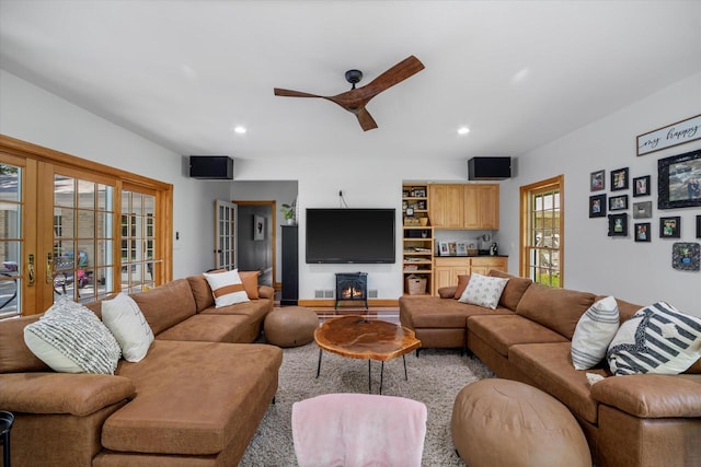 living room featuring ceiling fan