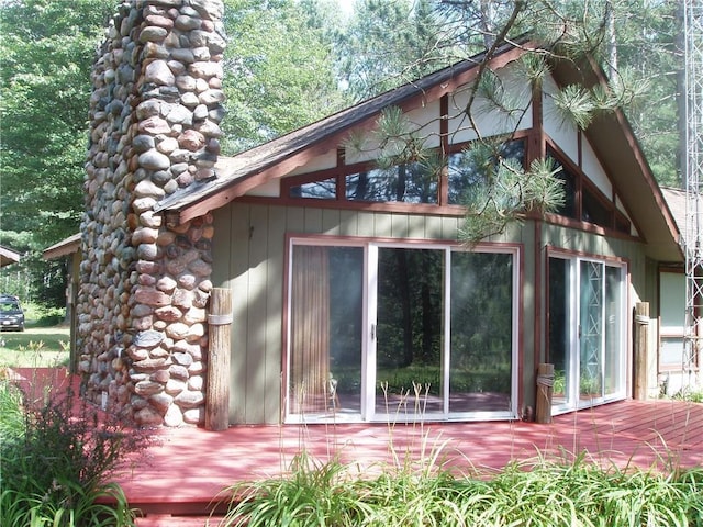 view of side of property with a chimney