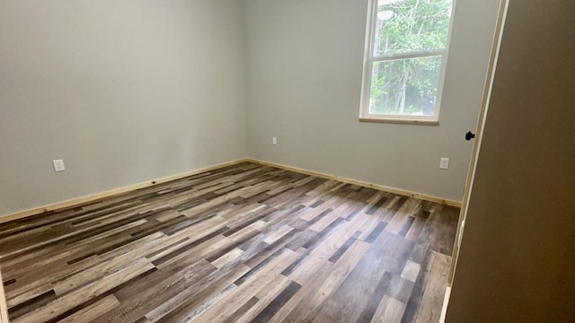 empty room featuring hardwood / wood-style floors