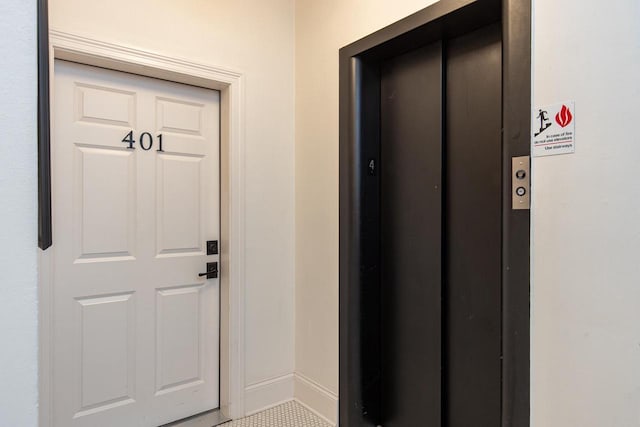 doorway to property with elevator