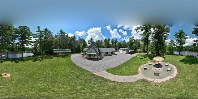 view of property with a front lawn and a garage