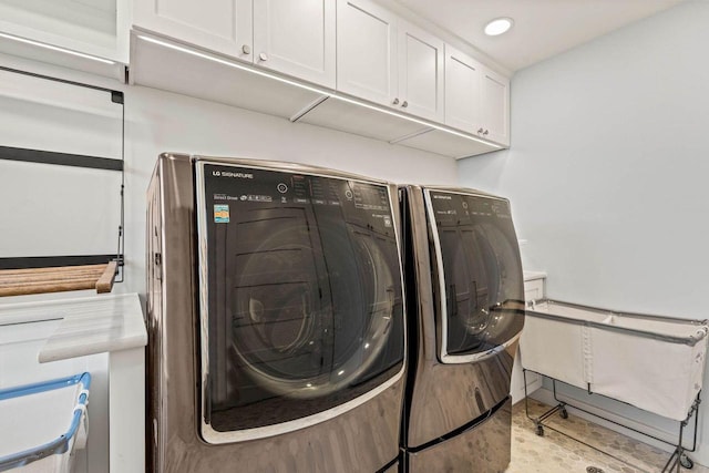 S77W18512 Janesville Rd, Muskego, WI 53150 - washroom with washing machine and dryer, cabinet space, and recessed lighting