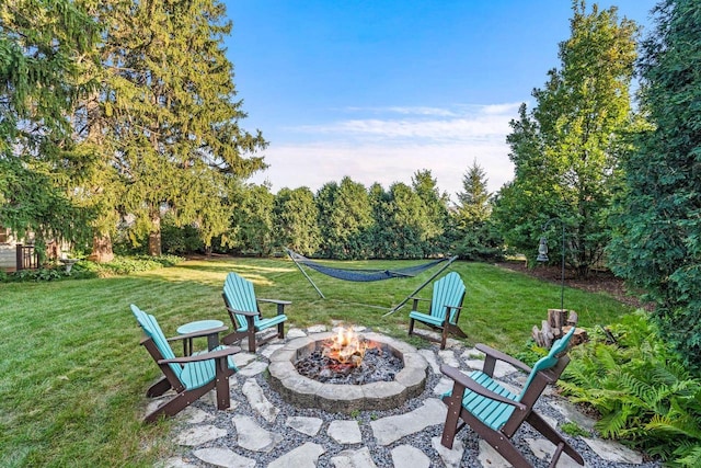 S77W18512 Janesville Rd, Muskego, WI 53150 - view of patio featuring a fire pit