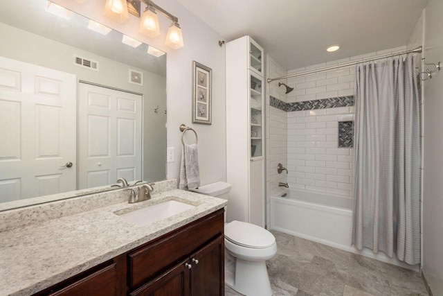 full bathroom with shower / tub combo with curtain, toilet, and vanity