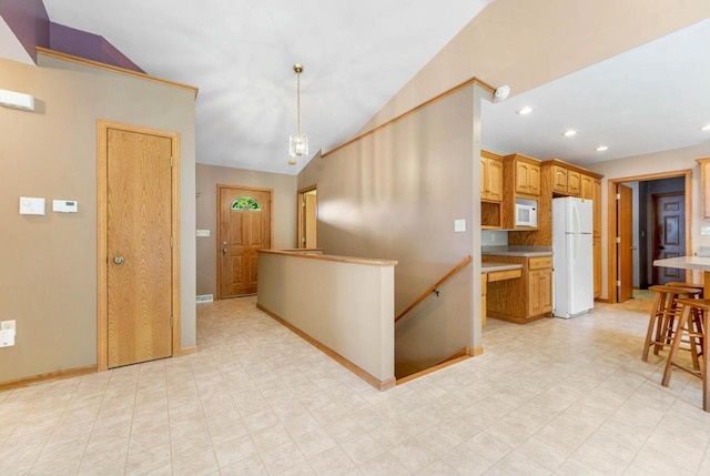 interior space featuring vaulted ceiling