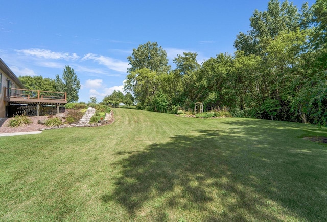 view of yard with a deck