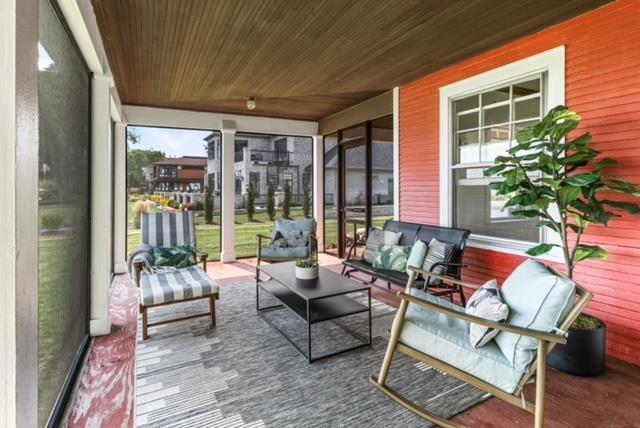 sunroom / solarium with wooden ceiling and plenty of natural light