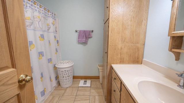 bathroom with vanity and tile patterned floors