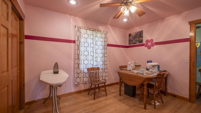 interior space featuring hardwood / wood-style floors and ceiling fan