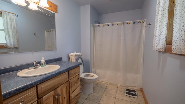 full bathroom with tile patterned floors, toilet, shower / tub combo with curtain, and vanity