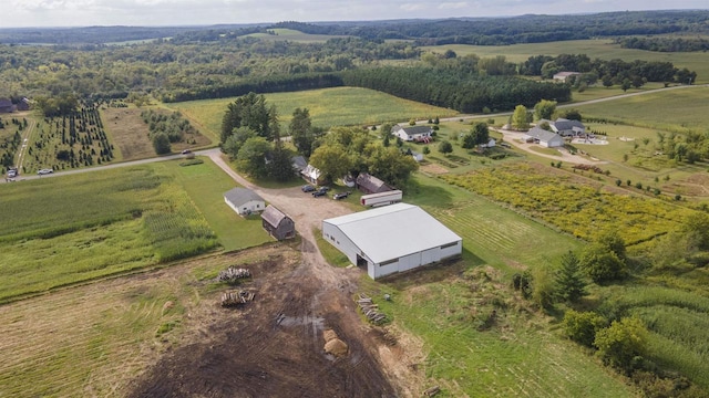 birds eye view of property featuring a rural view