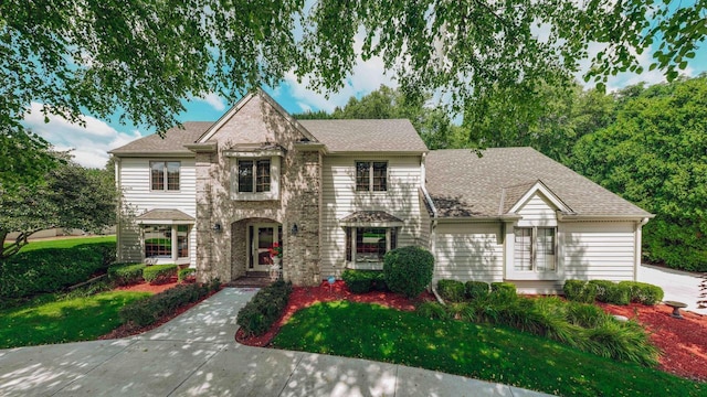 view of front of home with a front lawn