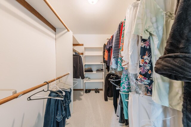 washroom with washer and dryer, cabinets, and light tile patterned flooring