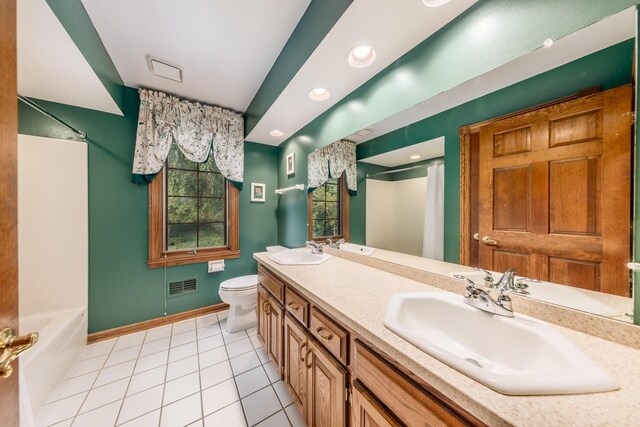 carpeted spare room with ceiling fan and lofted ceiling with skylight