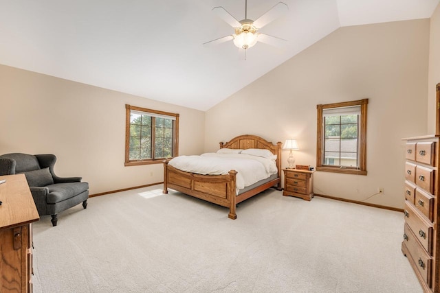 carpeted bedroom with ceiling fan, high vaulted ceiling, and multiple windows