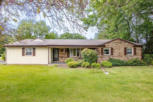 ranch-style house with a front lawn