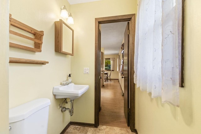 bathroom with sink and toilet