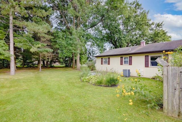 view of yard featuring central AC unit