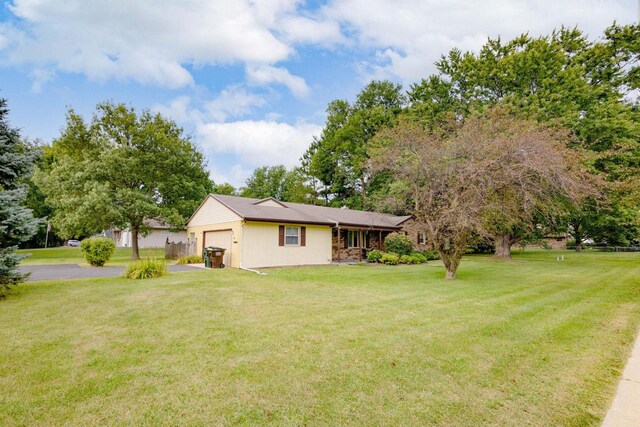 view of yard featuring a garage