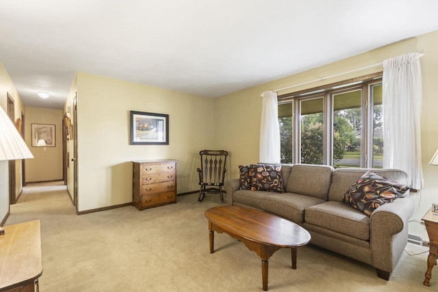 living room featuring light carpet